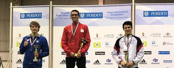 Giorgio Malan sorridente sul podio di Budapest